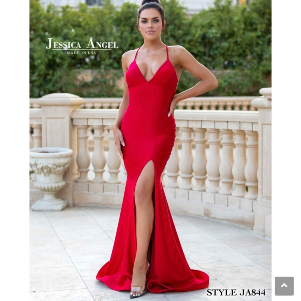 Jessica Angel red v-neck dress with an open lace up pinched back